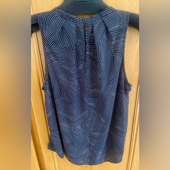 Ann Taylor sleeveless blouse. Button closure at neckline. - Picture 2 of 5
